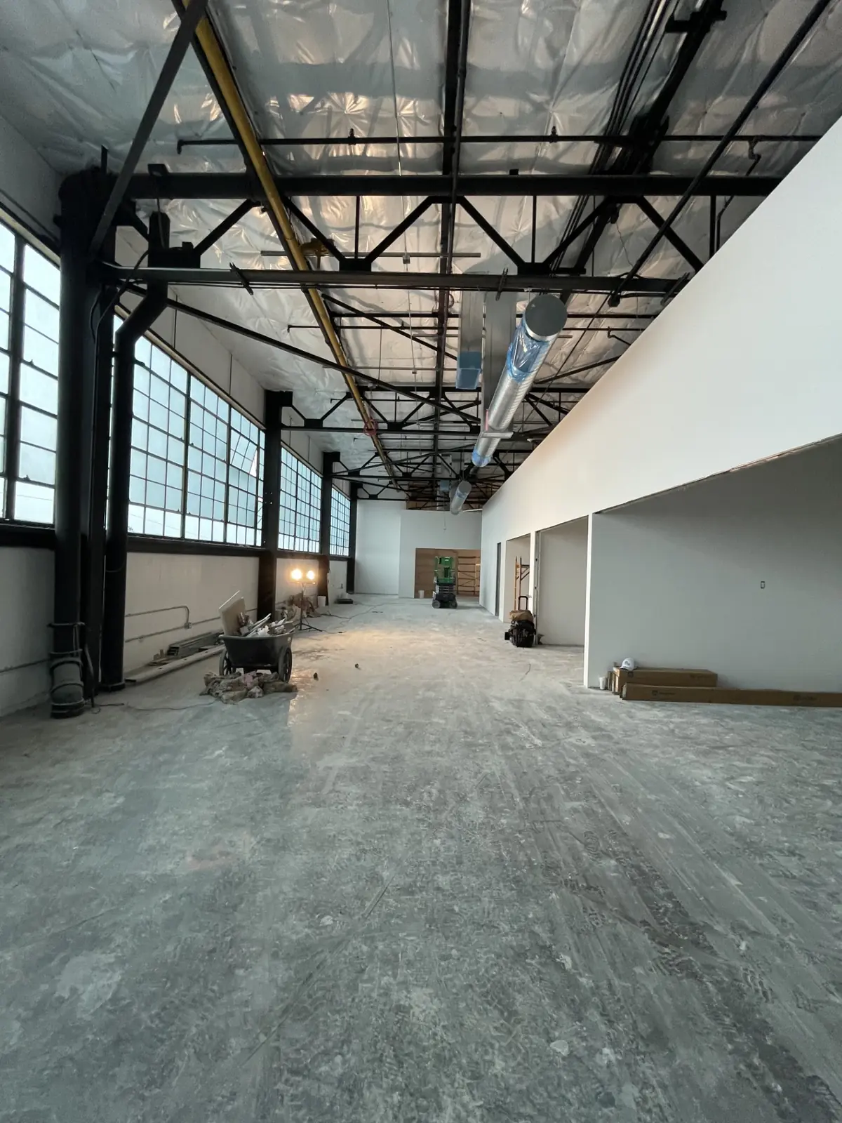 Open warehouse interior with a concrete floor